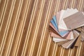 Samples of furniture or laminate  on desk of bamboo Royalty Free Stock Photo