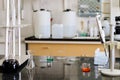 Samples in lab glassware surrounded by lab equipment in hospital laboratory Royalty Free Stock Photo