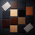 Samples of laminate and vinyl floor tile on black wooden background. Top view Royalty Free Stock Photo