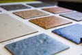 Samples of linoleum. Cutting and laying of floor coverings Royalty Free Stock Photo