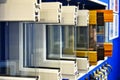 Samples of modern window profiles on a special showcase in the room. Services for the installation of Windows. Royalty Free Stock Photo