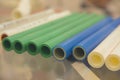 Samples of plastic water pipes on the stand Royalty Free Stock Photo