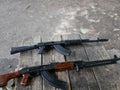Samples of Soviet automatic weapons of the second world war. Machine guns and machine guns on a wooden table outside on a summer d Royalty Free Stock Photo