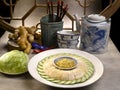 Samsui Ginger Chicken Final with cucumber served in a dish isolated on table side view Royalty Free Stock Photo