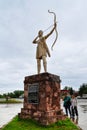 Samsun / Turkey - August 04 2019: Amazon girl statue with bow and arrow and tourists around