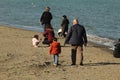 Samsun,Turkey - November 27, 2022 A grandpa taking a walk with his grandchildren