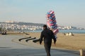 Samsun,Turkey - November 27, 2022 Man selling cotton candy on beach Royalty Free Stock Photo