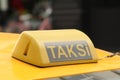 Samsun,Turkey - November 19, 2022 Taksi sign on a yellow car