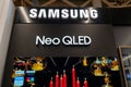 Samsung Logo and TV Neo Qled inside electronics store. Minsk, Belarus, 2023