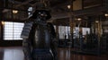 Samurai armor displayed in a dimly lit traditional exhibition setting Royalty Free Stock Photo