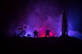 Samurai fighting concept. Silhouette of samurais in duel near tree and old temple. Picture with two samurais and sunset sky. Selec