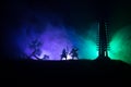 Samurai fighting concept. Silhouette of samurais in duel near tree and old temple. Picture with two samurais and sunset sky. Selec