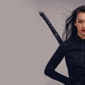 Samurai, ninja and portrait of woman with sword in studio isolated on gray background mockup. Face, sports and martial Royalty Free Stock Photo