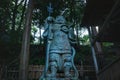 Samurai statue from low angle view at Mikami-jinja Shrine in Kyoto, Japan