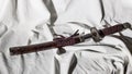 The samurai sword against a white sheet with tight shadows Royalty Free Stock Photo