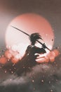 Samurai with sword standing on sunset background Royalty Free Stock Photo
