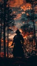 Samurai warrior silhouette at sunset in forest, dramatic sky concept Royalty Free Stock Photo