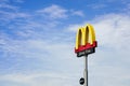 Samut Prakan, THAILAND-September 12, 2019 : McDonalds logo and drive thru sign with blue sky in front of McDonalds restaurant Royalty Free Stock Photo