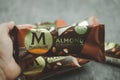 Samut Prakan, Thailand - April 16, 2022 : Magnum Almond. Ice cream covered in thick cracking Belgian chocolate and almond pieces