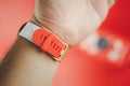 Samut Prakan, Thailand - June 27, 2020 : Red and white strap of The exclusive New Garmin Forerunner 245 Music Japan Edition