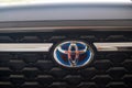 Samut Prakan, Thailand - March 12, 2022 : Close up special brand logo with blue background used by Toyota in Hybrid models