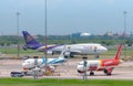 SAMUT PRAKAN, THAILAND-MAY 15, 2021 : Cargo aircraft parked at airfield in the airport. Cargo plane of Thai Airways, Vietjet Air,