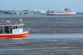 Ferry going from Samut Prakan during low tide