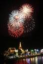 Night time of the most important place of worship at Phra Samut Chedi and firework.