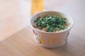 Samut Prakan, Thailand - October 8, 2022 : Porridge pork in paper bowl cup from McDonald`s