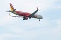 SAMUT PRAKAN, THAILAND-OCTOBER 14, 2022 : Vietjet Air commercial plane flying on the sky. Under view airplane. Passenger plane