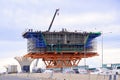 Engineers and construction workers are building the large concrete column structure of elevated expressway Royalty Free Stock Photo
