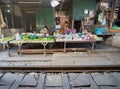 Samut Sakhon, Thailand-November 15, 2020: vegetable vendor in Mae Klong Railway Market Hoop Rom Market, Samut Songkhram Province