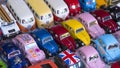 Samut Songkhram, Thailand - August22,2020 : Rows of many miniature retro vehicle toys on table top for sale in generic market