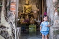 SAMUT SONGKHRAM THAILAND, 27 February 2018: Unidentified people pray golden Buddha statue inside the ancient temple of Wat Bang Royalty Free Stock Photo