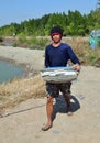 Samut Songkhram, Thailand: Fisherman with Basket