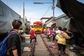 Samut Songkhram,Thailand-May 13,2019:Tourists at Talat Rom Hup,people visit Mae Klong Railway market or Mae Klong Train market, Royalty Free Stock Photo