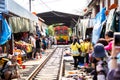 Samut Songkhram,Thailand-May 13,2019:Tourists at Talat Rom Hup,people visit Mae Klong Railway market or Mae Klong Train market, Royalty Free Stock Photo