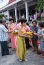 SAMUTPRAKARN, THAILAND - OCT 09 : women dress like a thai goddess join at Buddhist monks for End of Buddhist Lent Day. on October