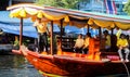 SAMUTSAKORN, THAILAND - JULY Boat in Parade candle statue to temple at Katumban in Samutsakorn, Thailand