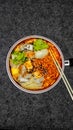 samyang spicy noodle with egg, tofu, and some vegetable