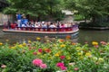 San Antonio River Boat Tour with Flowers Royalty Free Stock Photo