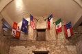 San Antonio, Texas, U.S - April 6, 2024 - Six flags inside of the Alamo church, representing the six nations to rule over the Royalty Free Stock Photo