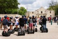 San Antonio, Texas, U.S - April 6, 2024 - Visitors on the Segway tour in front of the Alamo