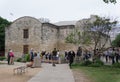 San Antonio, Texas, U.S - April 6, 2024 - Visitors walking at the back of the area of the Alamo church