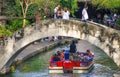 San Antonio, TX - March 16, 2008: Tourists and locals along the city river on a boat tour Royalty Free Stock Photo