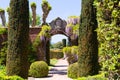 San Carlos, California, USA - May 05, 2019: A pathway in Filoli estate garden on sunny day with blue sky