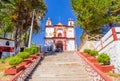 SAN CRISTOBAL DE LAS CASAS, MEXICO, MAY, 17, 2018: Outdoor view of Christian Catholic chapel on a hill with colorful