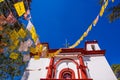 SAN CRISTOBAL DE LAS CASAS, MEXICO, MAY, 17, 2018: Outdoor view of Christian Catholic chapel on a hill with colorful