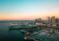 San Diego bay area with high buildings, cruisers and an aircraft carrier Royalty Free Stock Photo