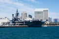 San Diego bay with USS Midway museum and downtown buildings Royalty Free Stock Photo